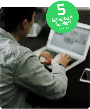 Person working on laptop illustrating omnichannel subscription commerce strategy — Challenges & Solutions Guide 1